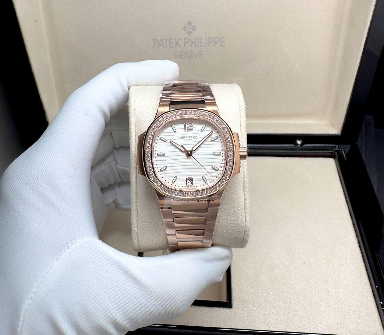 PATEK PHILIPPE NAUTILUS 7118/1200R-001 18K ROSE GOLD DIAMOND BEZEL SILVER DIAL  35.2 MM